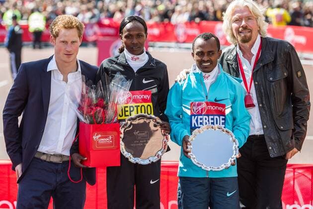 21.04.2013 London, England. Elite winners Priscah Jeptoo (Kenya) and Tsegaye Kebede (Ethiopia) pose with HRH Prince Harry and Sir Richard Branson following the The Virgin London Marathon. xDavidxFearnx  ActionPlus11399766