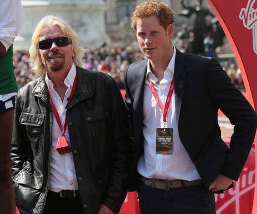 HRH Prince Harry and Virgin CEO Sir Richard Branson in the Winners enclosure at the 2013 London Marathon in London on April 21 2013.  LON2013042115