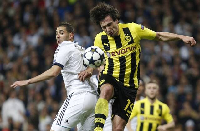 Karim Benzema - Mats Hummels Madrid 30 4 2013. Soccer match between Real Madrid andBorussia Dortmund corresponding tosemifinal of the Champions League, held at the Santiago Bernabeu stadium, in Madrid 4 30 2013. 