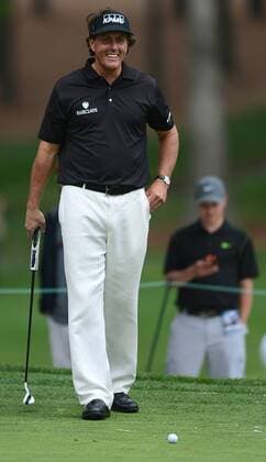 May 1, 2013 - Charlotte, NC, USA - Phil Mickelson smiles as he lines up a putt on the 16th green during the Pro-Am at Quail Hollow Club ahead of the Wells Fargo Championship in Charlotte, North Carolina, on Wednesday, May 1, 2013. Wells Fargo Championship - ZUMAm67