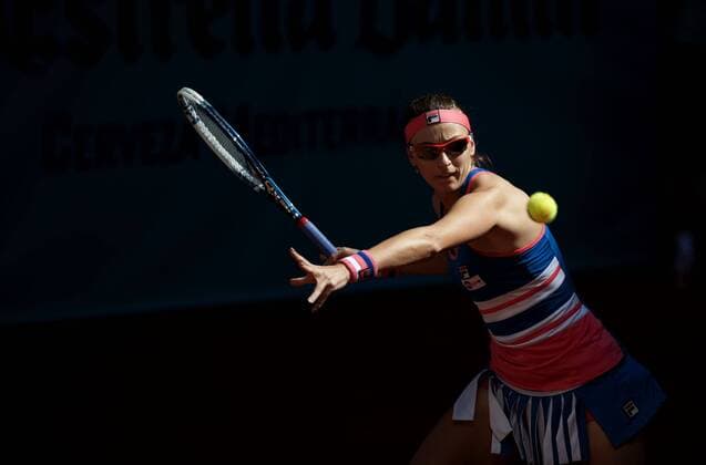 (130505) -- MADRID, May 5, 2013 (Xinhua) -- Yaroslava Shvedova of Kazakhstan returns the ball during the women s first round of WTA Tennis Damen Madrid Open in Madrid, capital of Spain, May 5, 2013. 