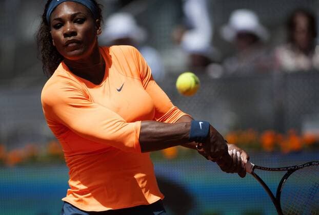 (130505) -- MADRID, May 5, 2013 (Xinhua) -- Serena Williams of the United States returns the ball during the women s first round of WTA Tennis Damen Madrid Open in Madrid, capital of Spain May 5, 2013. 