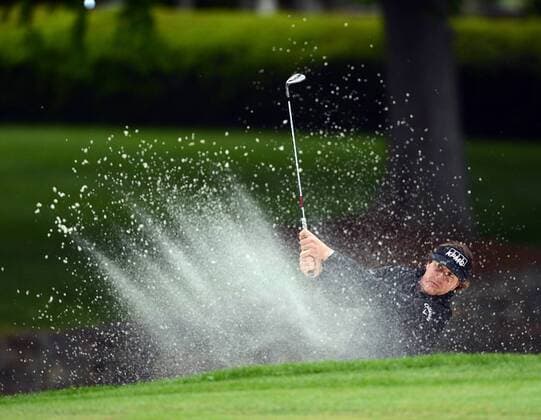 May 5, 2013 - Charlotte, NC, USA - Phil Mickelson hits out of the sand onto the 7th green during the final round of the Wells Fargo Championship at Quail Hollow Club in Charlotte, North Carolina, Sunday, May 5, 2013. WELLS FARGO PGA Golf Herren TOURNAMENT - ZUMAm67