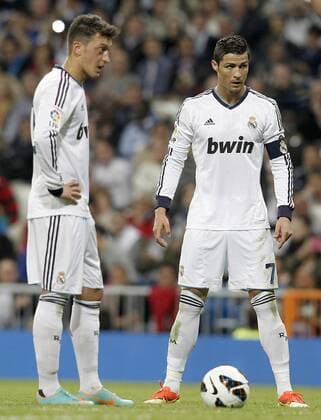 Real Madrid s Mesut Ozil (l) and Cristiano Ronaldo during La Liga match.May 08,2013.  (1585027)
