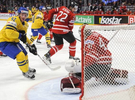 Stockholm 2013 05 0 Ice-Hockey World Championship 2013 - Sweden SWE vs Canada CAN - Pictures shows Gabriel Landeskog SWE 92, Luke Schenn CAN 22 and gk Mike Smith CAN 41 KPkod 08002 