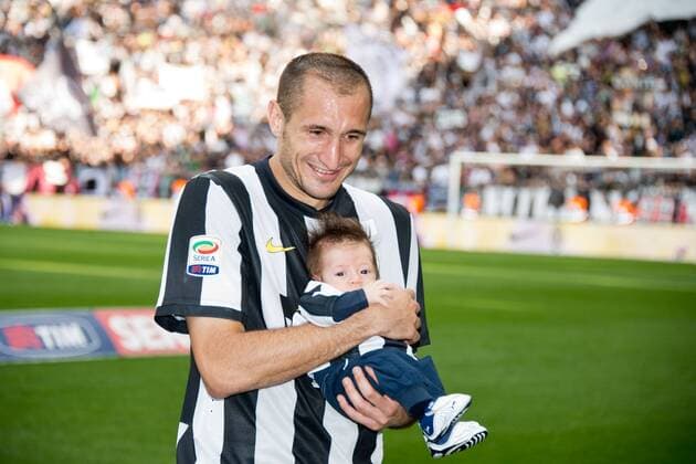 Giorgio Chiellini (Juventus), MAY 11, 2013 - Football Soccer : Giorgio Chiellini of Juventus Turin celebrates their league title (29th Scudetto) with his son at Juventus Stadium in Turin, Italy,  ( bxlb047420)