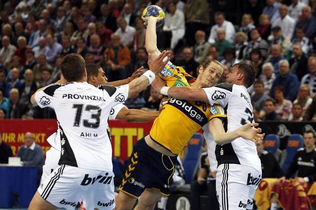 Kiel, 14. Mai 2013 - Handball, 1. Bundesliga 2012 13, THW Kiel - Rhein-Neckar Löwen: Daniel Narcisse (THW Kiel, 25), Kim Ekdahl Du Rietz (Rhein-Neckar Löwen, 60), Momir Ilic (THW Kiel, 31)