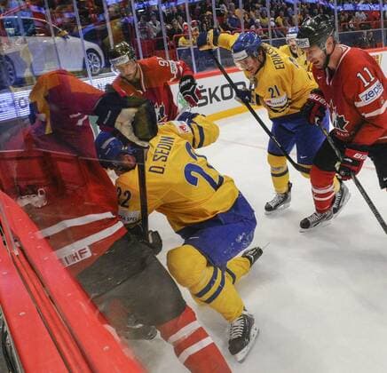Stockholm 2013 05 16 Ice-Hockey World Championship 2013 - Canada CAN vs Sweden SWE - Pictures shows Dan Hamhuis CAN 2, Daniel Sedin SWE 22, Loui Eriksson SWE 21 and Jordan Staal CAN 11 - KPkod 08002 