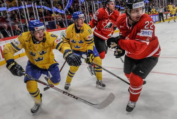 Stockholm 2013 05 16 Ice-Hockey World Championship 2013 - Canada CAN vs Sweden SWE - Pictures shows Gabriel Landeskog SWE 92, Simon Hjalmarsson SWE 11, Ryan O Reilly CAN 90 and Luke Schenn CAN 22 - KPkod 08002 