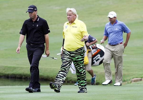 16 MAY 2013: Ryan Palmer and John Daly walk down the par 3 17th hole during the first round of the HP Byron Nelson Championship played at TPC Las Colinas Four Season Resort in Irving, TX. GOLF: MAY 16 PGA Golf Herren - HP Byron Nelson Championship - First Round Icon1305160141 EDITORIAL USE ONLY