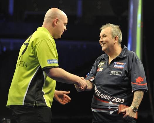 16.05.2013 London, England. Michael van Gerwen shakes hands with Phil Taylor before the final. The McCoy s 2013 PDC Premier League Darts Play-Offs from The O2 Arena. xStephenxBartholomewx  ActionPlus16585