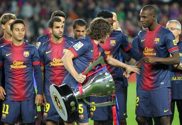 Carles PUYOL (Barcelona) - eric abidal FOOTBALL : FC Barcelona (Barca) Champion Primera Division 2012 2013 - Liga - 19 05 2013 PACOLARGO 
