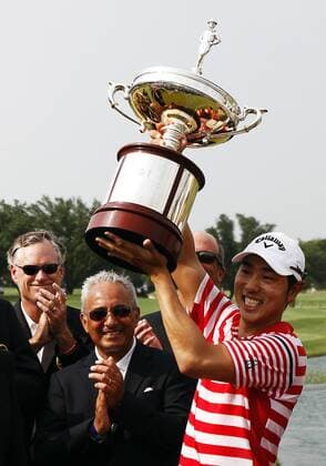 May 19, 2013: Sang-Moon Bae with winners trophy and Peggy Nelson the widow of the late Byron Nelson during the final round of the HP Byron Nelson Championship played at TPC Las Colinas Four Season Resort in Irving, TX. GOLF: MAY 19 PGA Golf Herren - HP Byron Nelson Championship - Final Round Icon1305190932 EDITORIAL USE ONLY