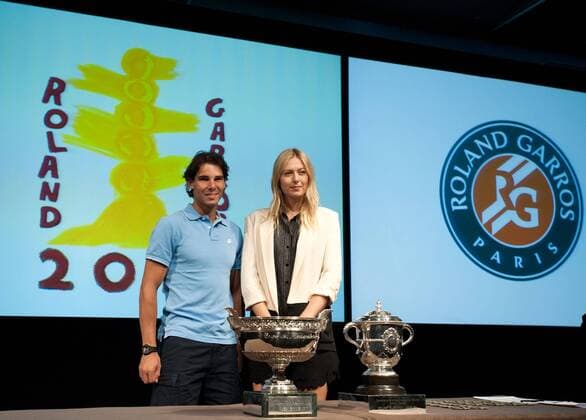 (130524) -- PARIS, May 24, 2013 (Xinhua) -- Maria Sharapova (R) of Russia and Rafael Nadal of Spain attend the draw ceremony of 2013 French Open tennis tournament at Roland Garros in Paris, France, on May 24, 2013. (Xinhua Bai Xue) (jyc) (SP)FRANCE-PARIS-TENNIS-2013 FRENCH OPEN-DRAW CEREMONY 