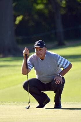 St. Louis, MO, USA - May 24, 2013: Rocco Mediate looks over his upcoming putt on the 1 hole during the second round of the Senior PGA Golf Herren Championship at Bellerive Country Club in St. Louis. PGA Golf Herren 2013: Senior PGA Golf Herren Championship Second Round MAY 24 - ZUMAc04