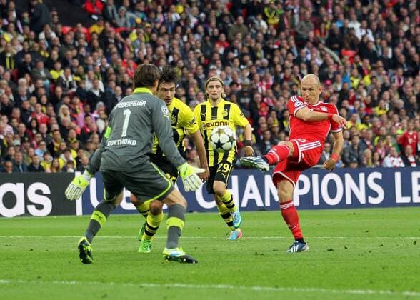 Dortmund s Roman Weidenfeller saves from Munich s Arjen Robben - Borussia Dortmund vs Bayern Munich - UEFA Champions League Final - Wembley Stadium - London - England -25 05 2013 - EDITORIAL USE ONLY. No use with unauthorised audio, video, data, fixture lists, club league logos or live services. Online in-match use limited to 120 images, no video emulation. No use in betting, games or single club league player publications.