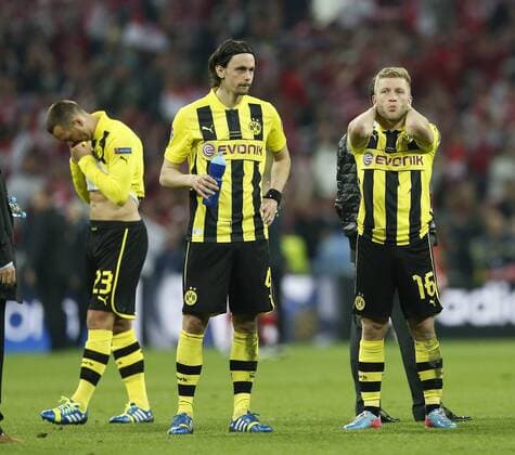 Dortmund s Jakub (Kuba) Blaszczykowski looks on dejected at the final whistle - Borussia Dortmund vs Bayern Munich - UEFA Champions League Final - Wembley Stadium - London - England -25 05 2013 - EDITORIAL USE ONLY. No use with unauthorised audio, video, data, fixture lists, club league logos or live services. Online in-match use limited to 120 images, no video emulation. No use in betting, games or single club league player publications.