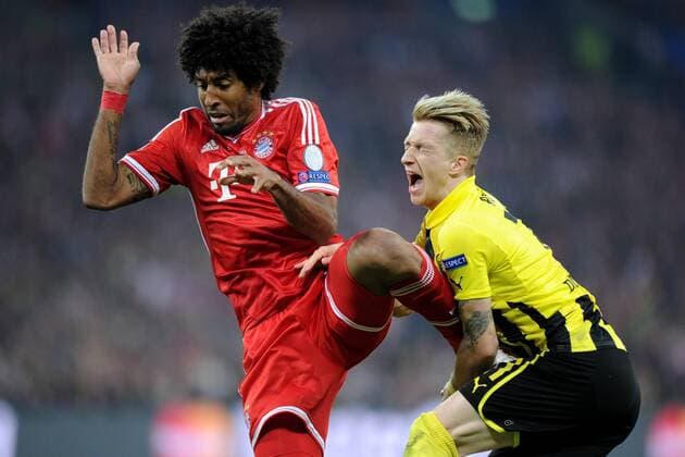 25.05.2013 LONDON, STADION WEMBLEY ( FOOTBALL ) FINAL UEFA 2012 2013 ( UEFA CHAMPIONS LEAGUE FINAL 2013 ) BORUSSIA DORTMUND (BVB) - FC BAYERN MÜNCHEN ( GAME ); DANTE (L), MARCO REUS (R) -  20130525CSMS0084