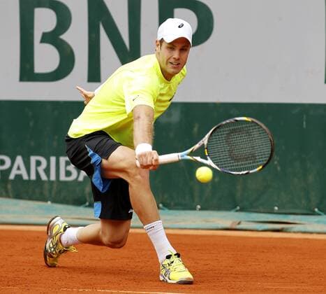 French Open 2013, Roland Garros,Paris,ITF Grand Slam Tennis Tournament, Julian Reister (GER),Aktion,Einzelbild,Ganzkoerper,Querformat