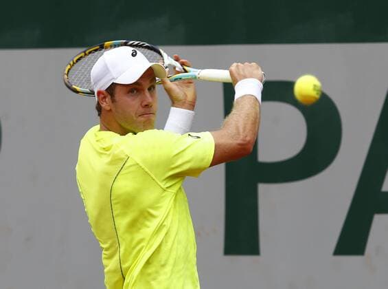 French Open 2013, Roland Garros,Paris,ITF Grand Slam Tennis Tournament, Julian Reister (GER),Aktion,Einzelbild,Halbkoerper,Querformat