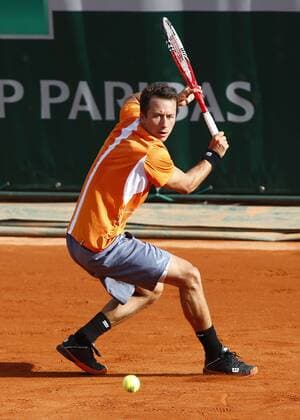 French Open 2013, Roland Garros,Paris,ITF Grand Slam Tennis Tournament, Philipp Kohlschreiber (GER),Aktion,Einzelbild, Ganzkoerper,Hochformat,von oben,