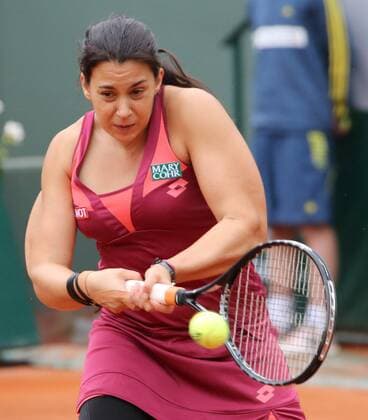 Marion Bartoli of France hits a shot during her French Open women s first round match at Roland Garros in Paris on May 28, 2013.  PAR20130528723