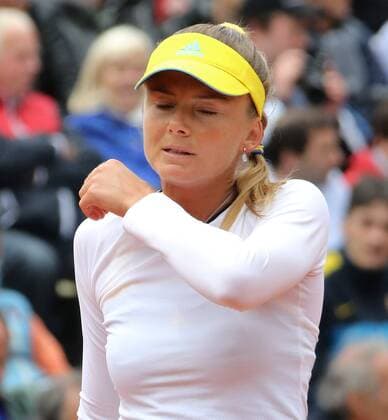 Daniela Hantuchova of Slovakia reacts after a shot during her French Open women s first round match at Roland Garros in Paris on May 28, 2013.  PAR20130528728