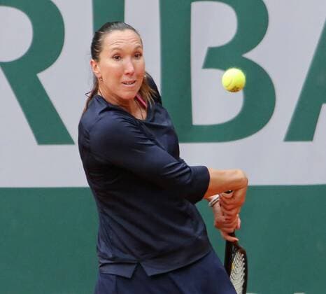Serbian Jelena Jankovic hits a shot during her French Open women s first round match at Roland Garros in Paris on May 28, 2013.  PAR20130528730