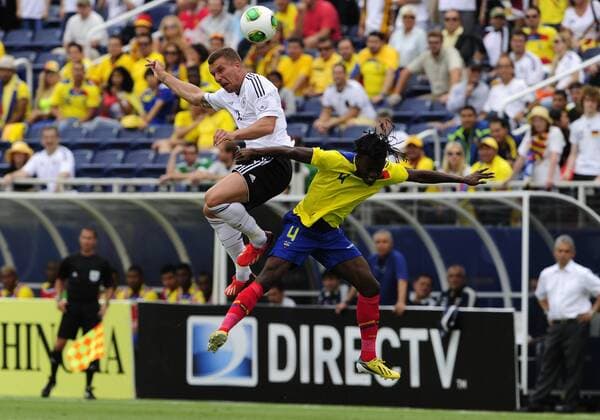 MAY 29 2013: Boca Raton, Florida, USA, Germany s (10) Lukas Podolski and Ecuador s (4 ) Juan Carlos Parades during Germany v Ecuador friendly International soccer match. SOCCER: MAY 29 Germany v Ecuador Icon1305290646 EDITORIAL USE ONLY