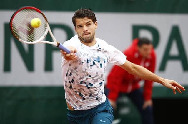 French Open 2013, Roland Garros,Paris,ITF Grand Slam Tennis Tournament, Grigor Dimitrov (BUL), Aktion,Einzelbild,Halbkoerper,Querformat,