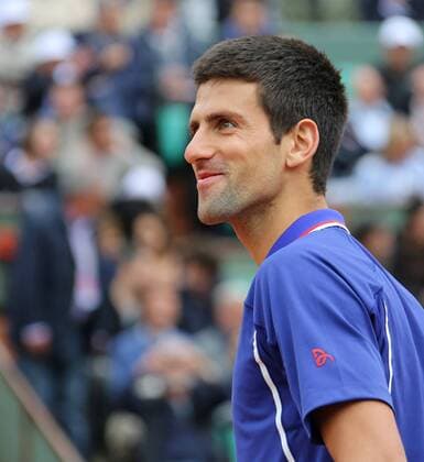 Serbian Novak Djokovic awaits the start of his French Open men s second round match at Roland Garros in Paris on May 30, 2013.  PAR20130530703