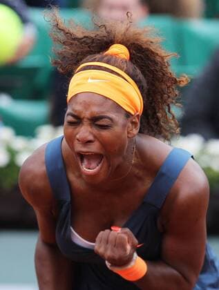 PARIS, May 31, 2013 -- Serena Williams of the United States celebrates during the women s singles third round match at the Roland Garros stadium in Paris May 31, 2013. 
