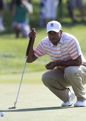 31 May 2013: Tiger Woods lining up a put during the second round of the Memorial Tournament held at Muirfield Village G.C. in Dublin, Ohio. GOLF: MAY 31 PGA Golf Herren - The Memorial Tournament - Second Round Icon130531024 EDITORIAL USE ONLY