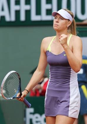 (130601) -- PARIS, June 1, 2013 (Xinhua) -- Maria Sharapova of Russia celebrates after winning women s singles third round match at the French Open tennis tournament at the Roland Garros stadium in Paris, France, June 1, 2013. 