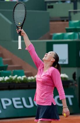 Serbia s Jelena Jankovic jubilates after the women s singles third round match at the 2013 French Open tennis tournament in Paris, France, on June 1, 2013. (SP)FRANCE-PARIS-TENNIS-FRENCH OPEN 