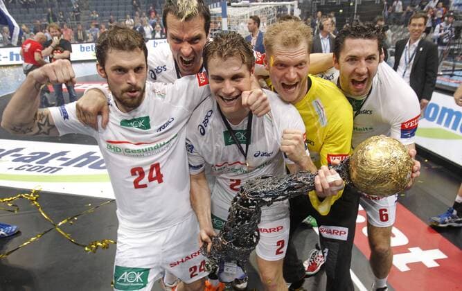 Hamburgs Fredrik Petersen (L), Pascal Hens (2.L), Michael Kraus, Johannes Bitter and Blazenko Lackovic celebrate the winning of the cup during the Champions league final of the Final 4 between HSV Hamburg and FC Barcelona Intersport, Lanxessarena in Cologne on June 02., 2013. HSV Hamburg gegen FC Barcelona Intersport im Finale des Champions League Final 4 Turnieres in der Saison 2012 2013 am 02. Juni 2013.