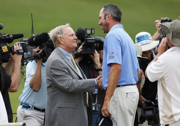 June 2, 2013 - Dublin, OH, USA - Matt Kuchar, right, shakes hands with Jack Nicklaus, left, after winning the Memorial Tournament at Muirfield Village Golf Club in Dublin, Ohio, Sunday, June 2, 2013. 2013 Memorial Tournament - ZUMAm67