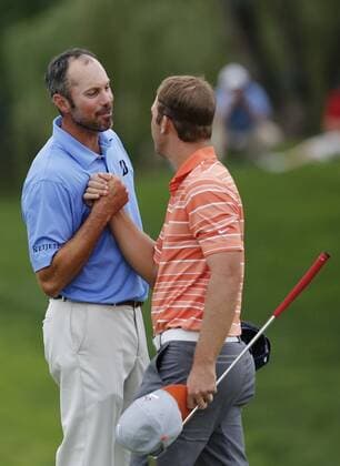 June 2, 2013 - Dublin, OH, USA - Matt Kuchar, left, shakes hands with Kevin Chappell, right, after winning the Memorial Tournament at Muirfield Village Golf Club in Dublin, Ohio, Sunday, June 2, 2013. 2013 Memorial Tournament - ZUMAm67