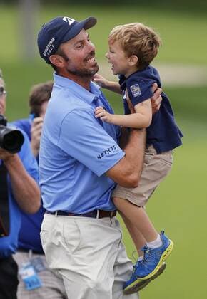 June 2, 2013 - Dublin, OH, USA - Matt Kuchar celebrates with his son Carson after winning the Memorial Tournament at Muirfield Village Golf Club in Dublin, Ohio, Sunday, June 2, 2013. 2013 Memorial Tournament - ZUMAm67
