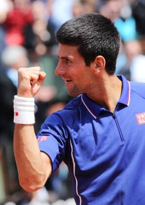 (130603) -- PARIS, June 3, 2013 (Xinhua) -- Serbia s Novak Djokovic celebrates after winning during the men s singles fourth round match at the French Open tennis tournament in Paris, France, on June 3, 2013. (Xinhua Gao Jing) (SP)FRANCE-PARIS-TENNIS-FRENCH OPEN-MS- 