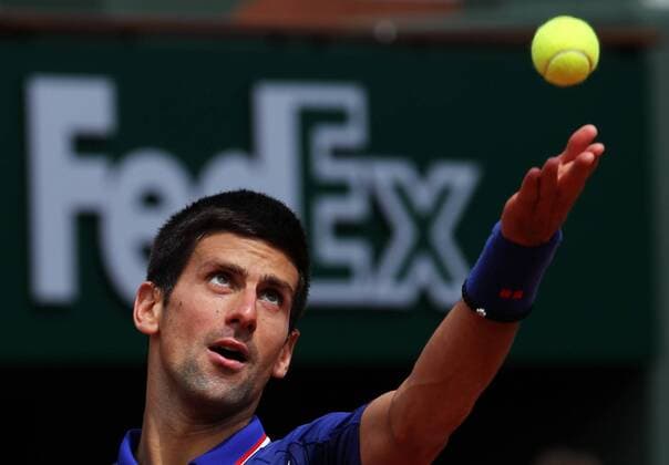 (130603) -- PARIS, June 3, 2013 (Xinhua) -- Serbia s Novak Djokovic serves during the men s singles fourth round match at the French Open tennis tournament in Paris, France, on June 3, 2013. (Xinhua Gao Jing) (SP)FRANCE-PARIS-TENNIS-FRENCH OPEN-MS- 