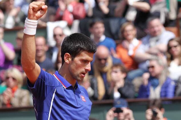 (130603) -- PARIS, June 3, 2013 (Xinhua) -- Serbia s Novak Djokovic celebrates after winning during the men s singles fourth round match at the French Open tennis tournament in Paris, France, on June 3, 2013. (Xinhua Gao Jing) (SP)FRANCE-PARIS-TENNIS-FRENCH OPEN-MS- 