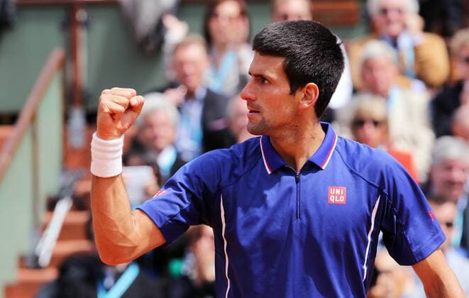 (130603) -- PARIS, June 3, 2013 (Xinhua) -- Serbia s Novak Djokovic celebrates his victory during the men s singles fourth round match at the French Open tennis tournament in Paris, France, on June 3, 2013. (Xinhua Gao Jing) (SP)FRANCE-PARIS-TENNIS-FRENCH OPEN-MS- 