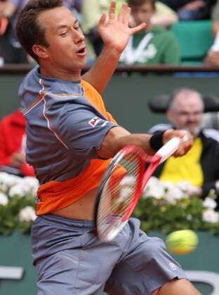 (130603) -- PARIS, June 3, 2013 (Xinhua) -- Germany s Philipp Kohlschreiber returns the ball during the men s singles fourth round match at the French Open tennis tournament in Paris, France, on June 3, 2013. (Xinhua Gao Jing) (SP)FRANCE-PARIS-TENNIS-FRENCH OPEN-MS- 