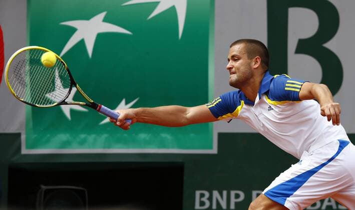French Open 2013, Roland Garros,Paris,ITF Grand Slam Tennis Tournament, Mikhail Youzhny (RUS), Aktion,Einzelbild,Halbkoerper,Querformat,