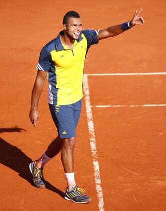 French Open 2013, Roland Garros,Paris,ITF Grand Slam Tennis Tournament,Jo-Wilfried Tsonga (FRA) jubelt nach seinem Sieg,Jubel, Emotion,Freude,,Aktion,Einzelbild,Ganzkörper,Hochformat,