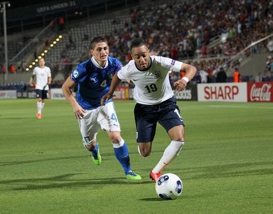 England s Nathan Redmond tussles with Italy s Marco Verratti - England U21 vs Italy U21 - UEFA U21 Championship 2013 - Bloomfield Stadium - Tel Aviv - 05 06 2013 - EDITORIAL USE ONLY. No use with unauthorised audio, video, data, fixture lists, club league logos or live services. Online in-match use limited to 120 images, no video emulation. No use in betting, games or single club league player publications.