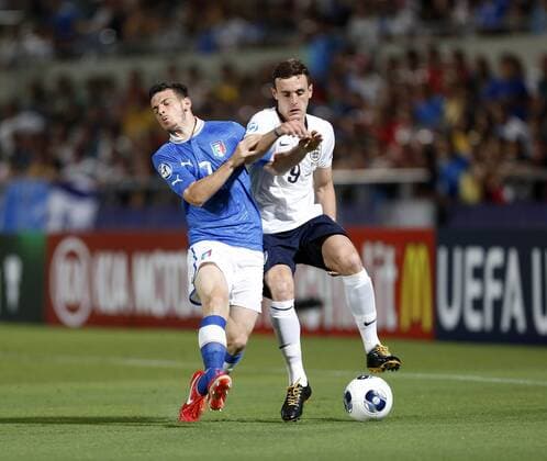 England s Jack Robinson tussles with Italy s Alessandro Florenzi - England U21 vs Italy U21 - UEFA U21 Championship 2013 - Bloomfield Stadium - Tel Aviv - 05 06 2013 - EDITORIAL USE ONLY. No use with unauthorised audio, video, data, fixture lists, club league logos or live services. Online in-match use limited to 120 images, no video emulation. No use in betting, games or single club league player publications.