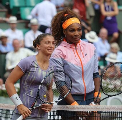 Italian Sara Errani (L) and American Serena Williams pose at the net before their French Open women s semifinal match at Roland Garros in Paris on June 6, 2013.  PAR20130606731