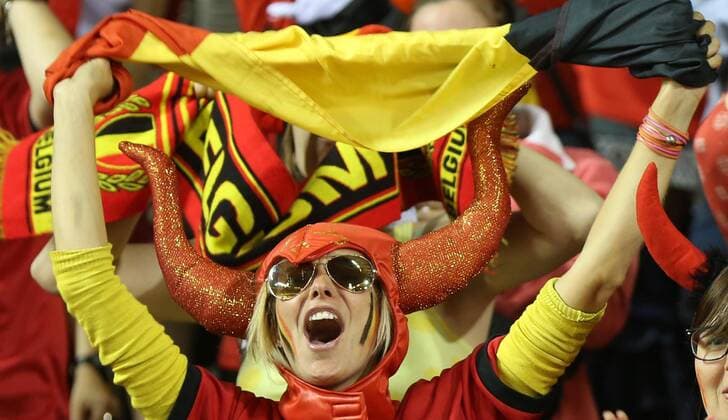 BRUSSELS, June 7, 2013 (Xinhua) -- A female fan of Belgium reacts during the 2014 World Cup qualifying soccer match in Brussels, Belgium, June 7, 2013. (Xinhua Gong Bing) (SP)BELGIUM-BRUSSELS-SOCCER-WORLD CUP QUALIFYING MATCH- 
